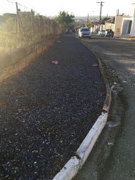 Construção da calçada da escola